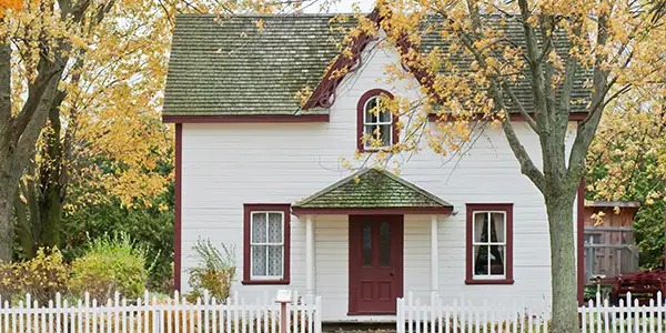 house with white fence